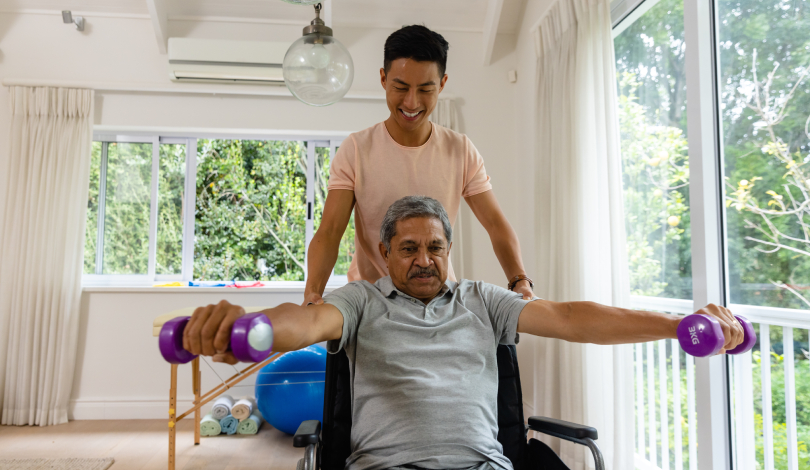 Senior receiving physiotherapy treatment